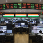 Indian shares flat at open as investors await RBI policy cues