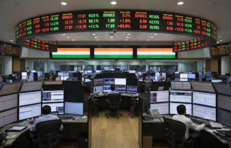 Indian shares flat at open as investors await RBI policy cues