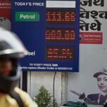 Fuel price display board at an Indian petrol pump showing petrol, diesel and CNG rates.