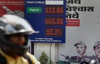 Fuel price display board at an Indian petrol pump showing petrol, diesel and CNG rates.