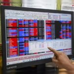 Stock market activity highlighting public sector and government-linked companies in India.