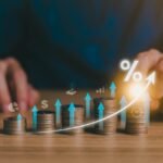 Financial market professionals analyzing equity market performance.