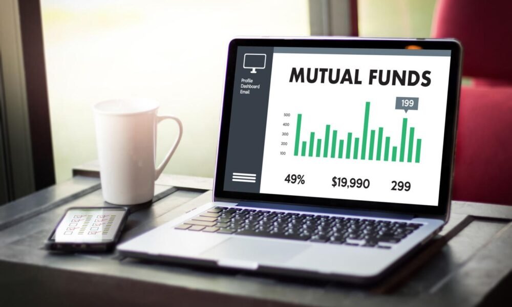 Investor reviewing mutual fund and investment portfolio performance.