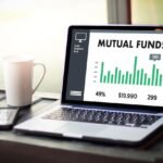 Investor reviewing mutual fund and investment portfolio performance.