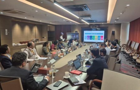 Financial professionals reviewing ESG reports and sustainability metrics.