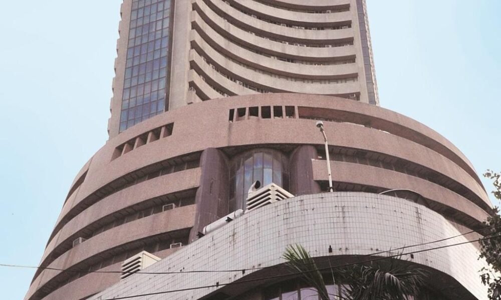Investor monitoring stock market activity following SEBI's buyback regulation update.