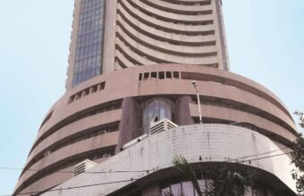 Investor monitoring stock market activity following SEBI's buyback regulation update.