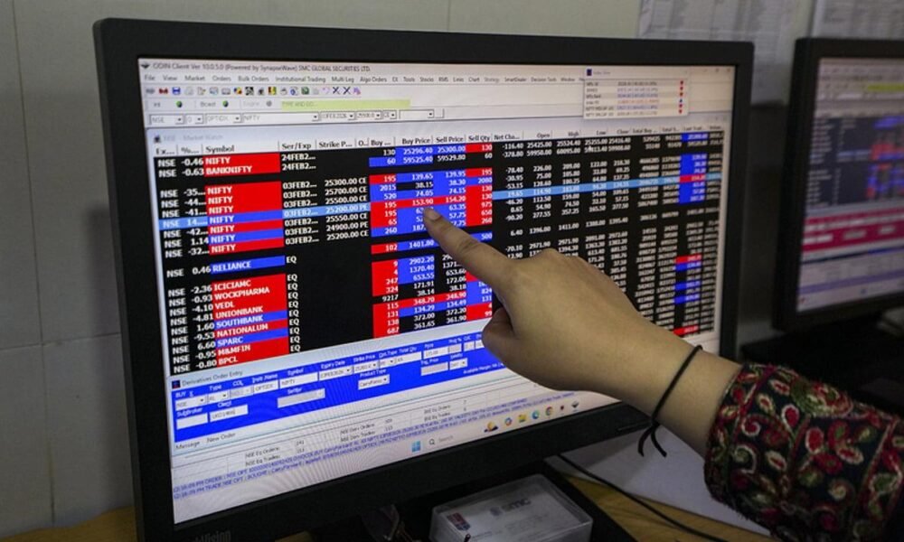 Investors monitoring Indian stock market performance during a trading session.